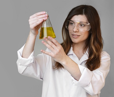 front-view-female-scientist-with-test-tube-copy-space
